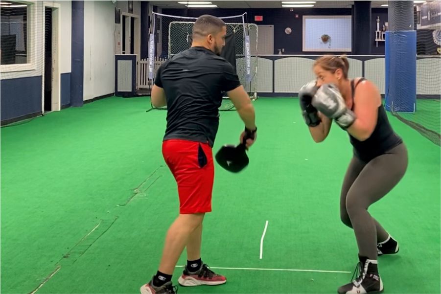 customer sparring with coach victor
